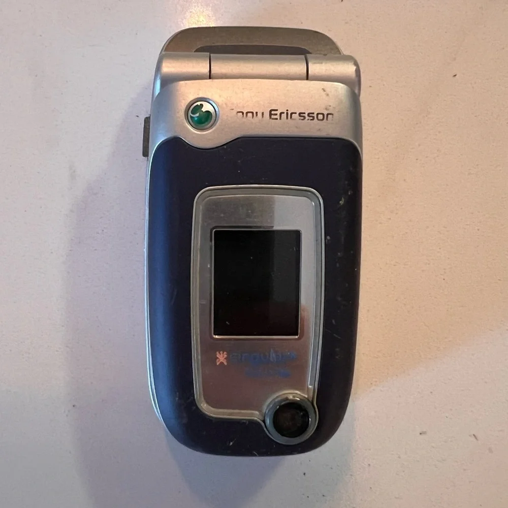 Vintage Sony Emerson flip phone